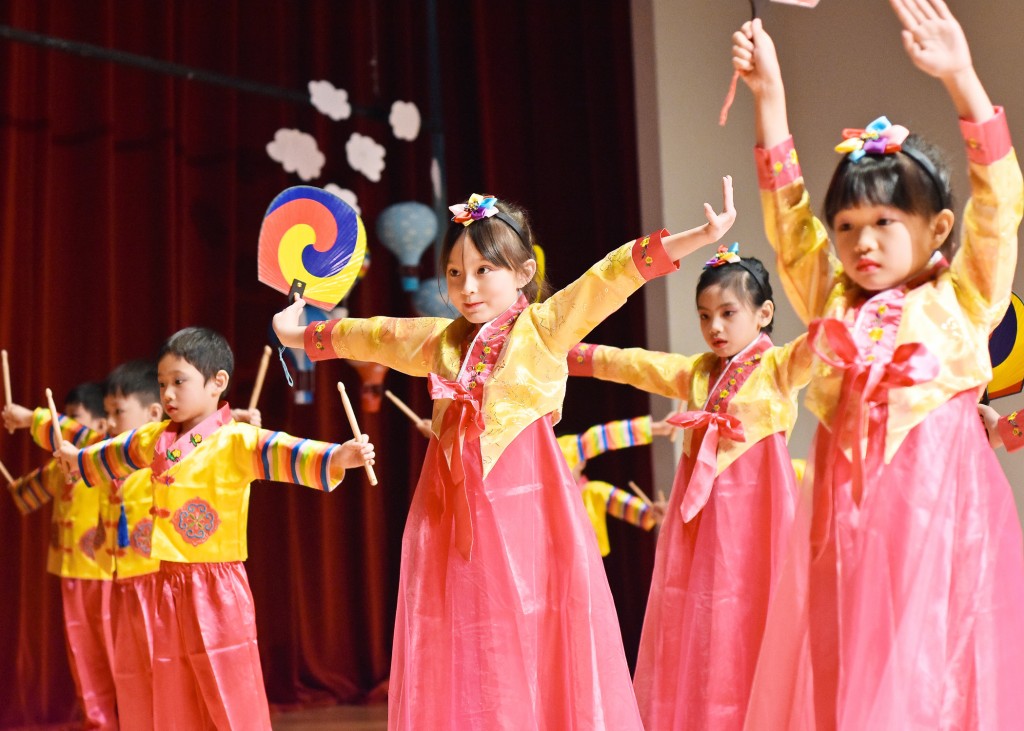 NurtureStars children in a drums performance capturing the sounds and colours of Korean culture.